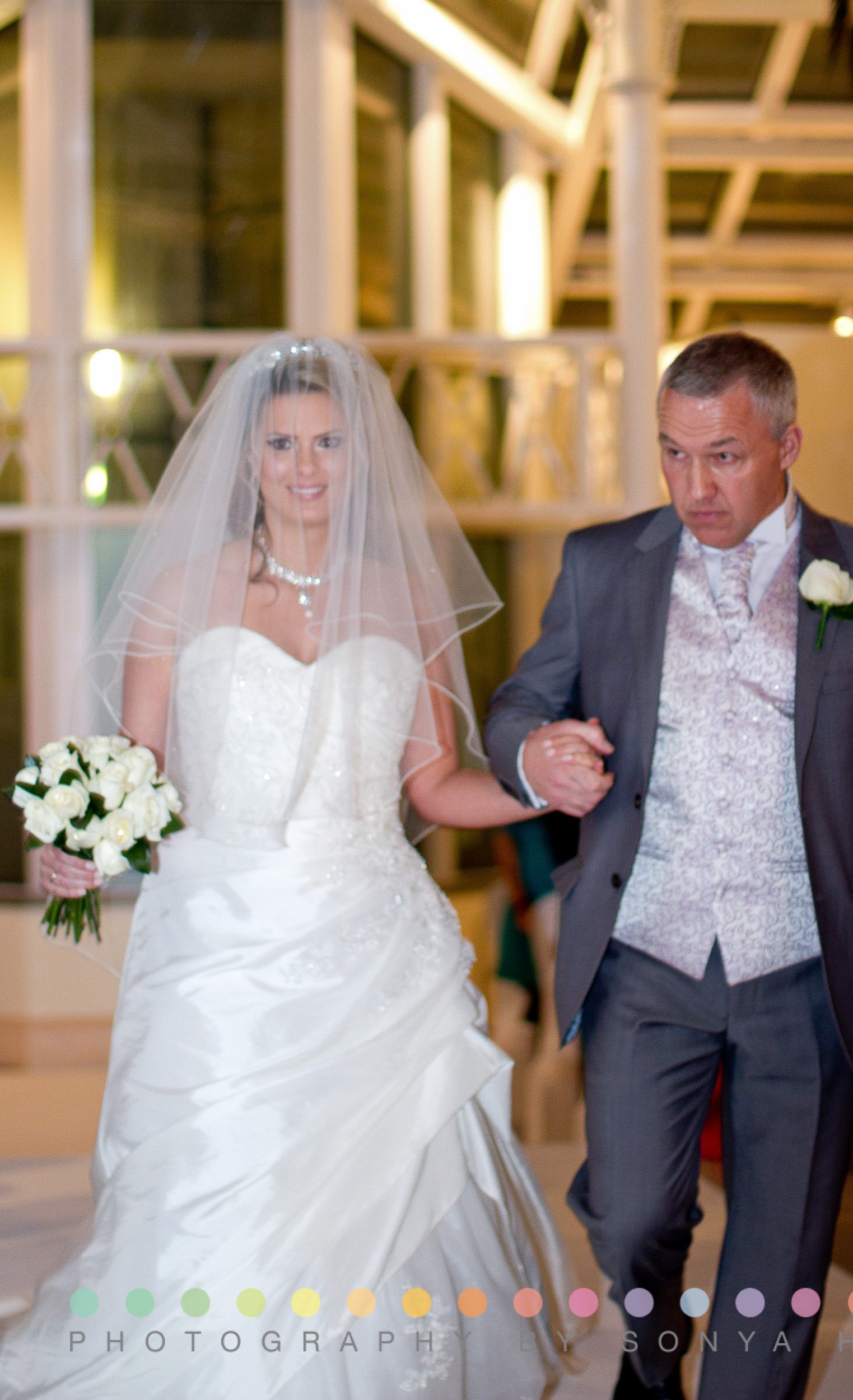 walking to the ceremony bright conservatory western bride a in central London millennium Gloucester hotel wedding