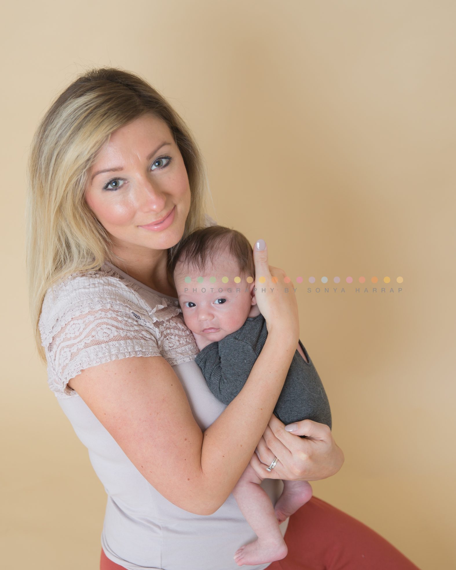 Newborn baby mother and son photograph by Sonya Harrap photography
