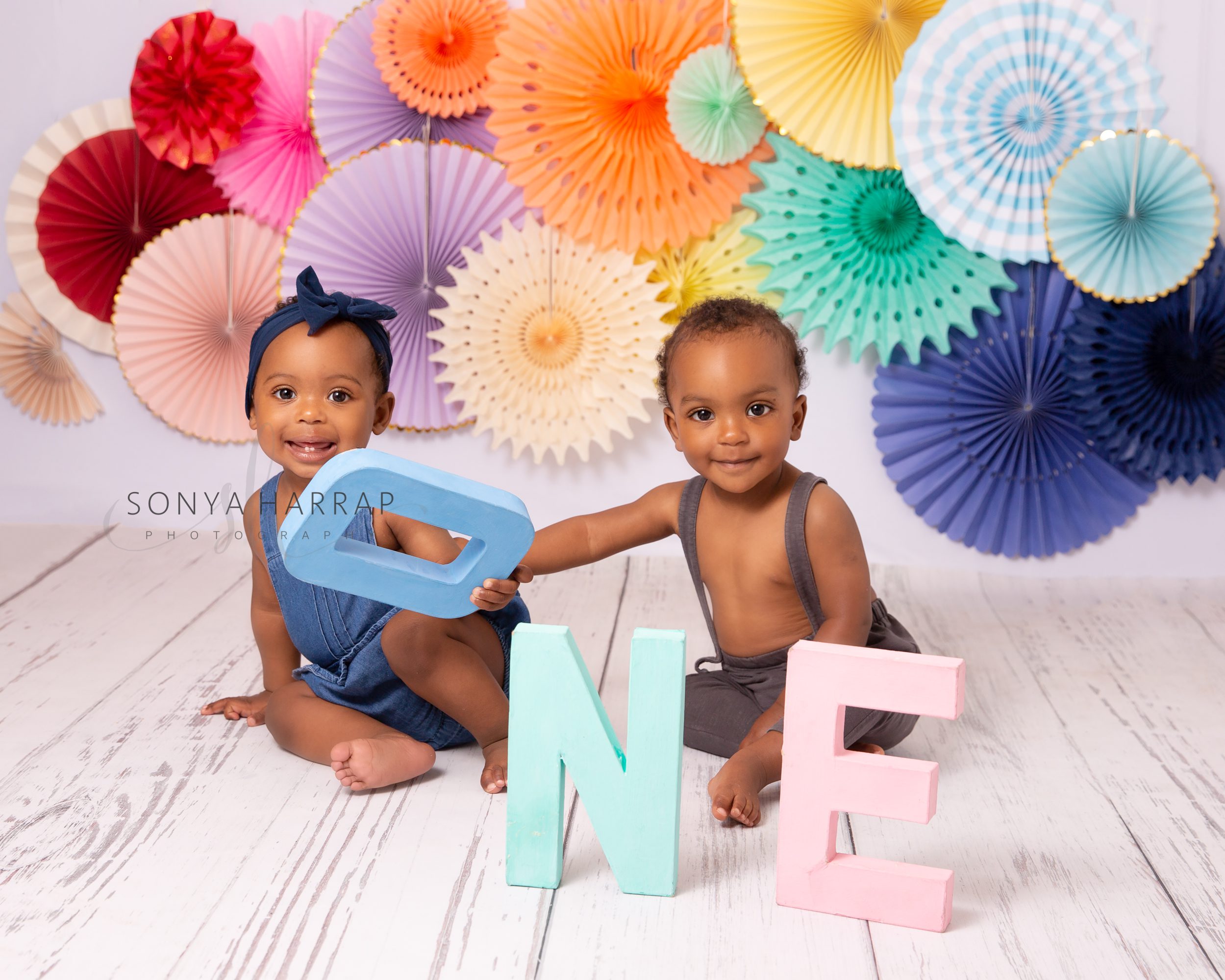 Rainbow twins red silk on green background Maternity and newborn photography Sonya Harrap Hertfordshire Welwyn garden city St Albands Hertford photographer --4