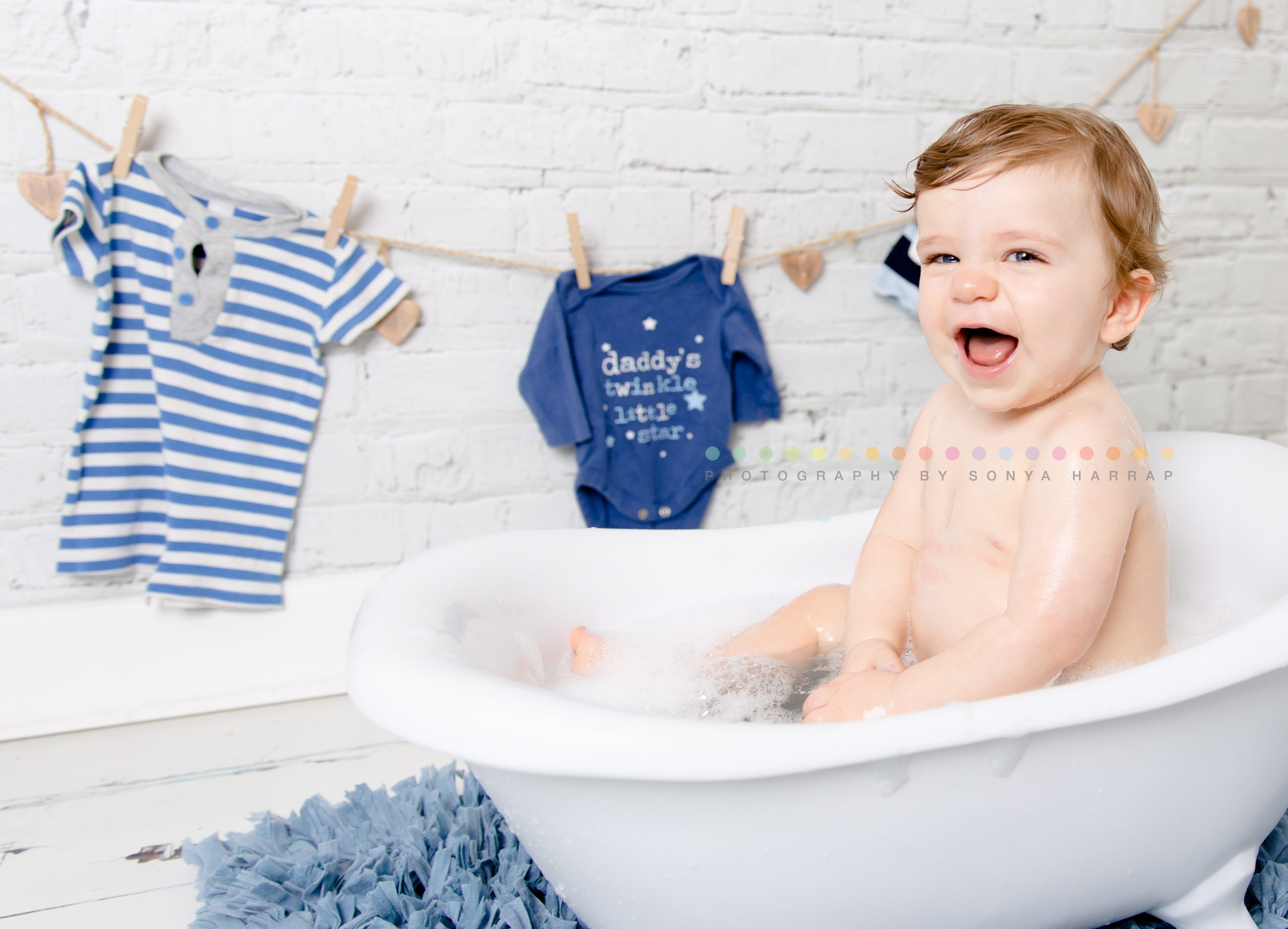 1 year old 1st birthday bubble bath photoshoot with baby boy by Sonya Harrap photography