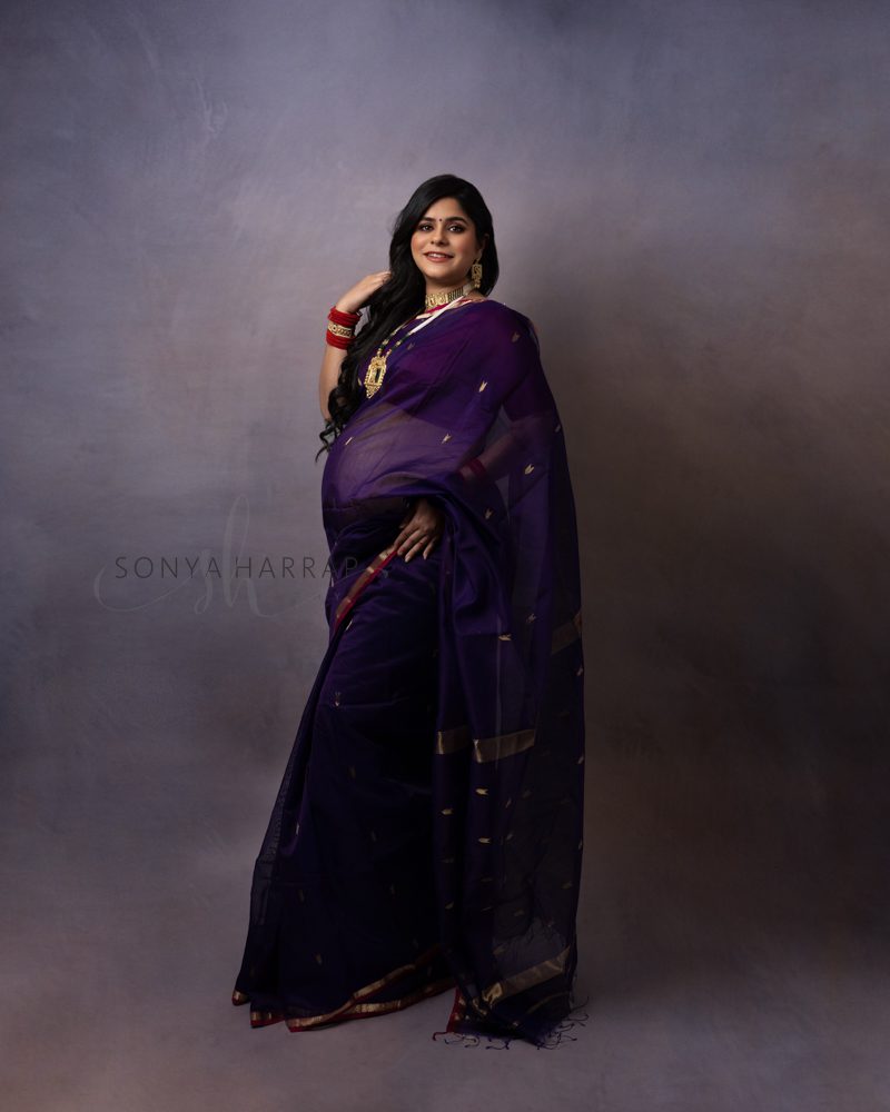 asian woman in a purple saree in a Modest Maternity photographer in Hertfordshire and North London