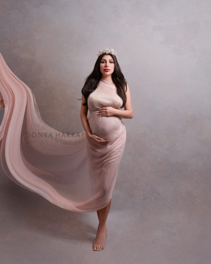 Light etherial maternity photo in pink- maternity photoshoot by best maternity photographer Sonya Harrap modest maternity photos by Sonya Harrap Photography Hertfordshire UK